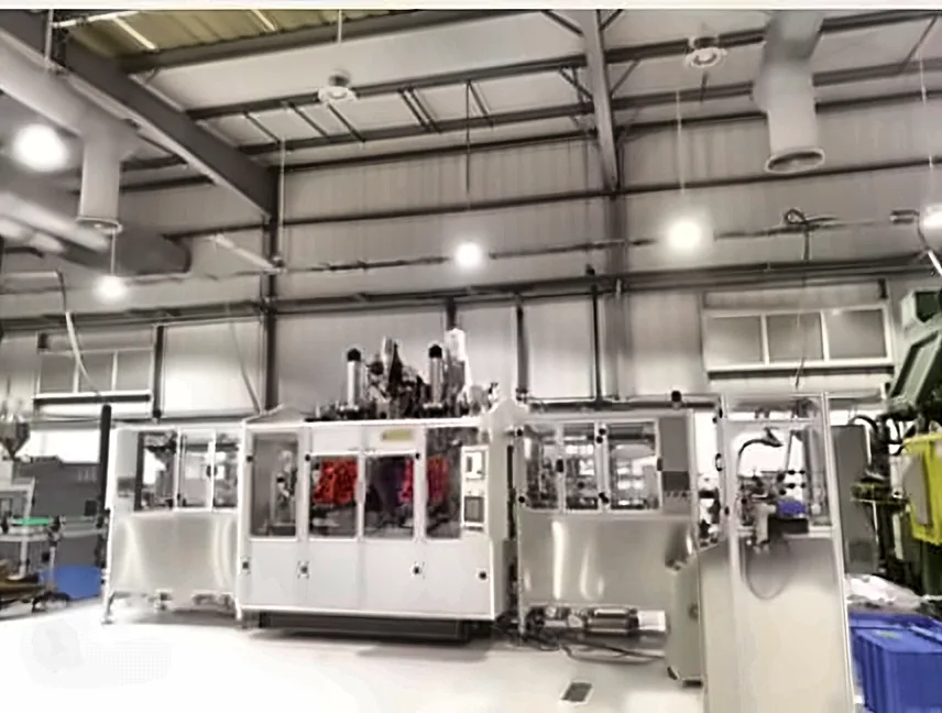 Enclosed white blow molding production line in a customer plant