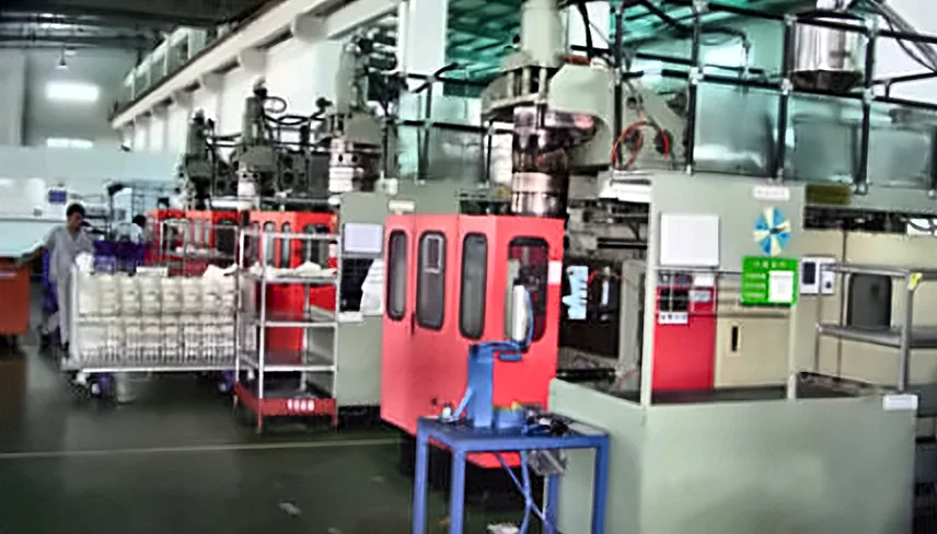 Red-cabinet blow molding machines in a customer plant