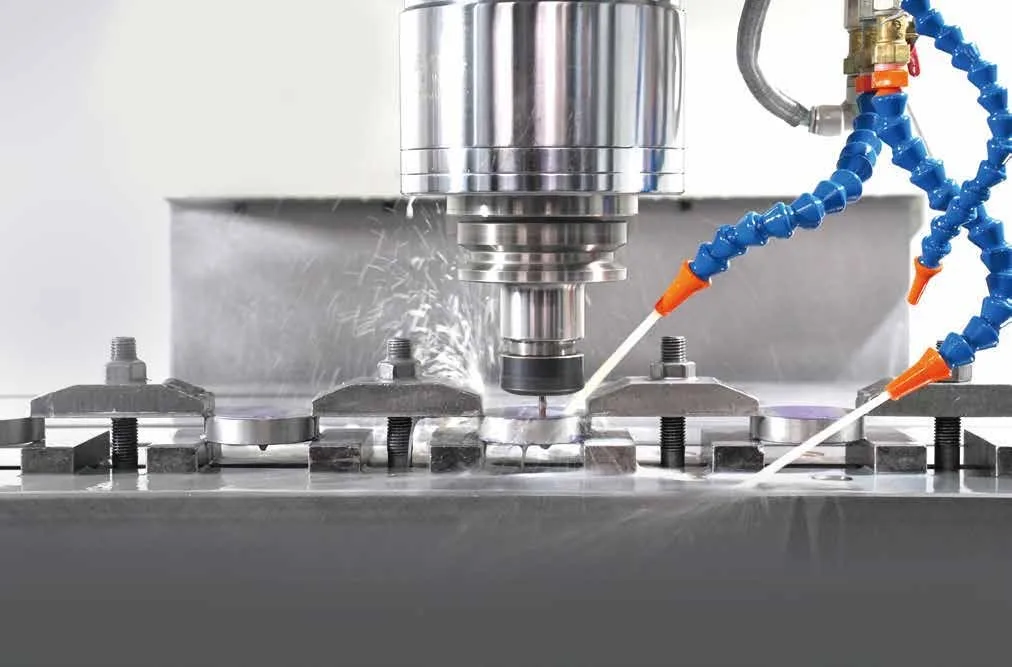 CNC machining center cutting a machine component