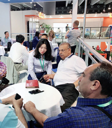 Discussion at an exhibition booth
