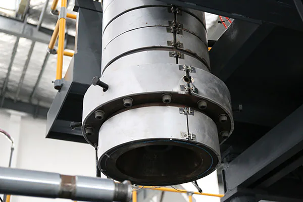 Extrusion die-head outlet close-up