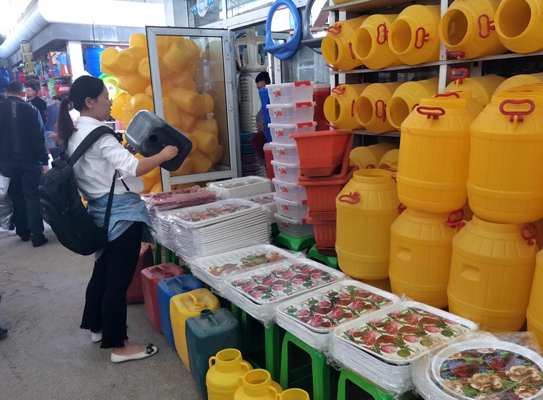 Plastic container display at a market