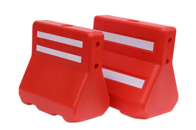 Red interlocking plastic traffic barriers